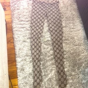 Gucci tights. I never got to wear them. Authentic.